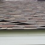 buckled-roof-shingles